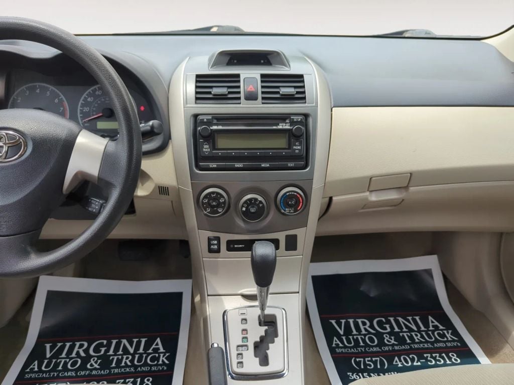 Pre-Owned 2012 TOYOTA COROLLA LE SEDAN 4D - photo - 1